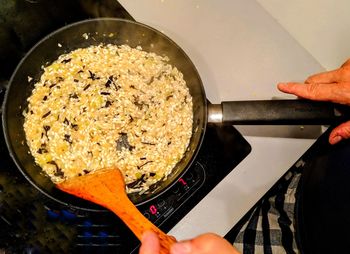 High angle view of person preparing food in kitchen