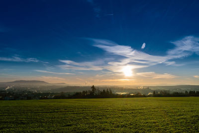 Scenic view of field against sky