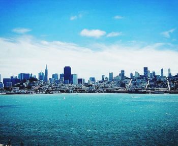 Cityscape against blue sky