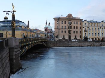 Bridge over river in city