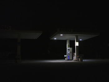 View of an abandoned car at night