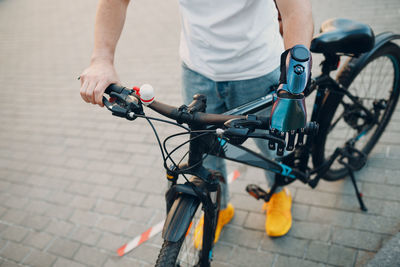 Man riding bicycle on street