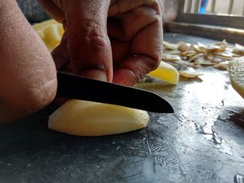 Close-up of person preparing food