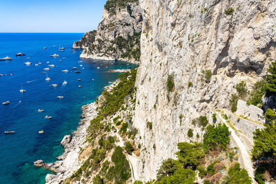 Scenic capri landscape from gardens of augustus viewpoint with via krupp descending to the sea