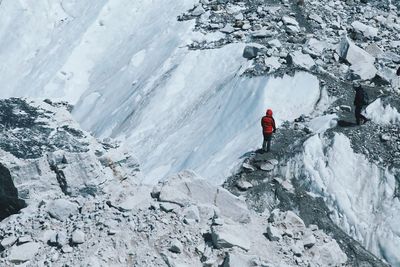 Person standing on barren landscape