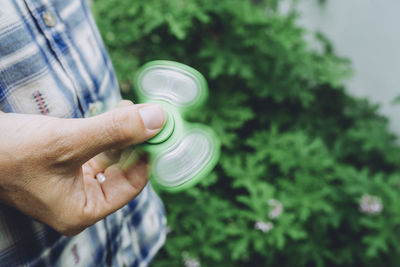 Close-up of hand holding bubble