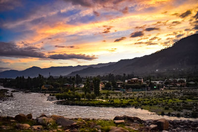 Scenic view of mountains against sky during sunset