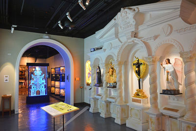 Statues in illuminated building