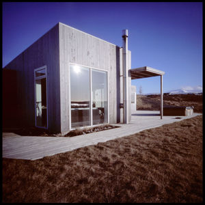 Exterior of abandoned building against clear sky