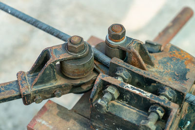 Close up bending reinforcement metal rebar rods in construction site.