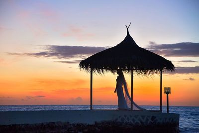 Scenic view of sea at sunset