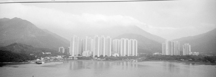 Scenic view of lake against cloudy sky