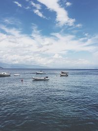 Boats sailing in sea