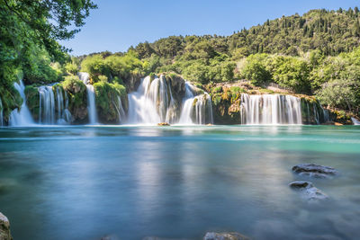 View of waterfall in forest