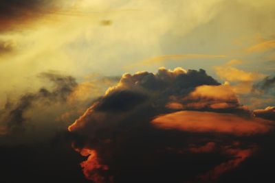 Low angle view of dramatic sky during sunset