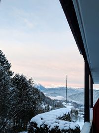 Scenic view of mountains against sky during winter