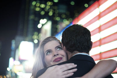 Portrait of couple kissing outdoors