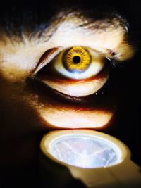 Close-up of illuminated eye