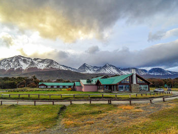 Scenic view of mountains against cloudy sky