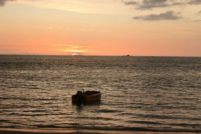 Scenic view of sea at sunset