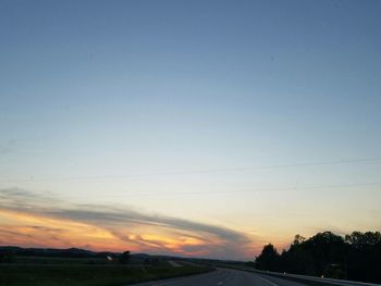 Scenic view of landscape against sky during sunset