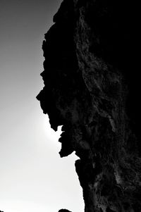 Low angle view of rock formation against clear sky