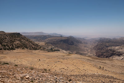 Scenic view of desert against clear sky