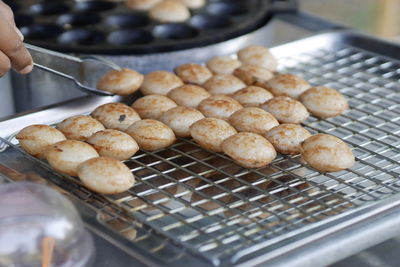 Close-up of person preparing food