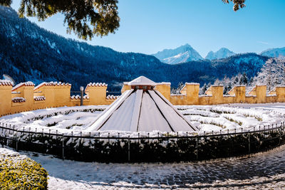 Scenic view of mountains against clear sky during winter