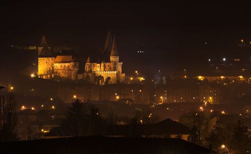 View of city lit up at night