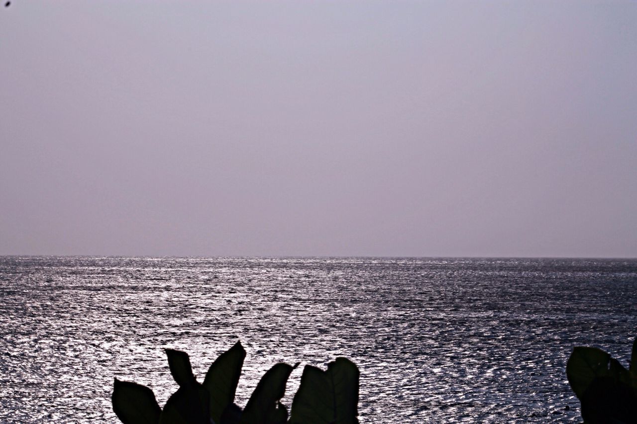 sea, water, horizon over water, clear sky, tranquil scene, beauty in nature, tranquility, copy space, scenics, rippled, nature, seascape, waterfront, idyllic, nautical vessel, outdoors, no people, sky, ocean, day