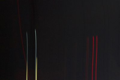 Low angle view of light trail at night
