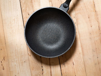 High angle view of black coffee on table