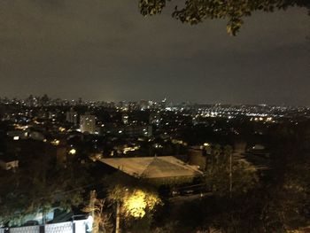 Illuminated cityscape at night