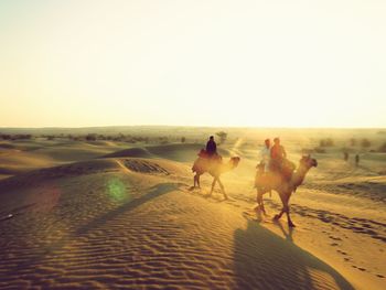 View of desert against clear sky