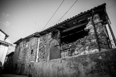 Low angle view of old building against sky