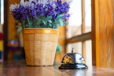 Close-up of flower vase on table