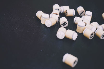 Close-up of pills on black background