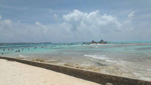 Scenic view of beach against sky