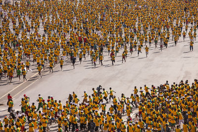 High angle view of people on street in city