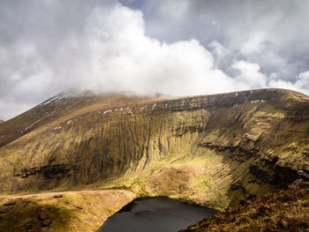 Scenic view of volcanic landscape against sky