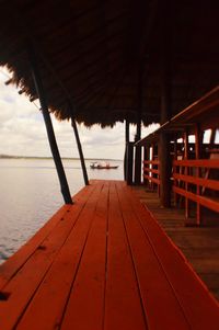 Pier over sea against sky