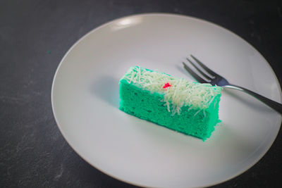 High angle view of cake in plate on table