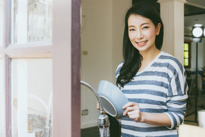 Portrait of a smiling young woman