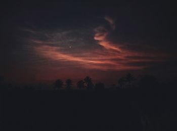 Scenic view of silhouette trees against sky during sunset