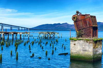 Scenic view of river against blue sky