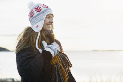 Smiling woman looking away