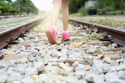 Low section of person on railroad track