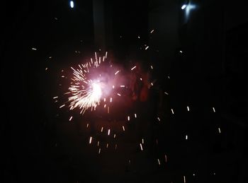 Firework display at night