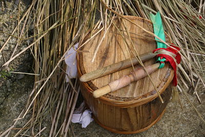 High angle view of wicker basket hanging on tree